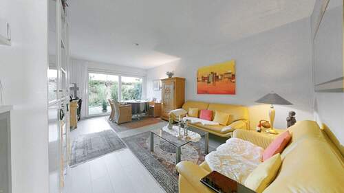 Wohnzimmer - Beispielfotos, Ausstattung und Zustand können variieren. - 2 Zimmer Etagenwohnung zum Kaufen in Münster