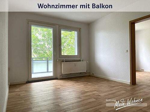 Wohnzimmer mit Balkon - 