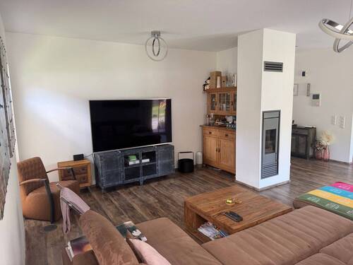 EG Wohnen mit Kaminofen - 