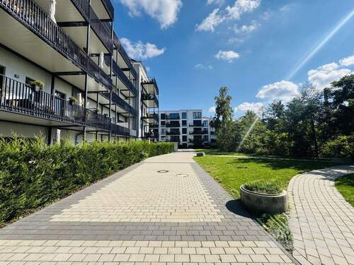 Wohnensemble - 'Moderne Gartenwohnung mit hochwertiger Ausstattung - direkt am Park mit Seeblick'