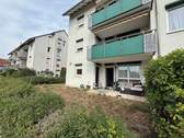 Garten - Moderne 4-Zimmer-Wohnung mit Terrasse, Garten und Tiefgaragenstellplatz