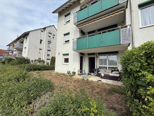 Garten - Moderne 4-Zimmer-Wohnung mit Terrasse, Garten und Tiefgaragenstellplatz
