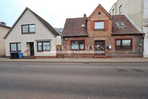 V10650 Außenaufnahme 1 - 2 Zimmer Mehrfamilienhaus, Wohnhaus zum Kaufen in Barmstedt