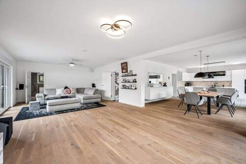 Wohnzimmer Ansicht 1 - Einfamilienhaus mit 205,00 m² in Mönchengladbach zum Kaufen
