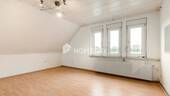1. OG Schlafzimmer 1 - 
