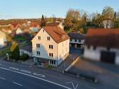 Straßenansicht - Immobilienpaket. Wohn- und Geschäftshaus + Einfamilienhaus mit 4 Garagen in Melsungen.