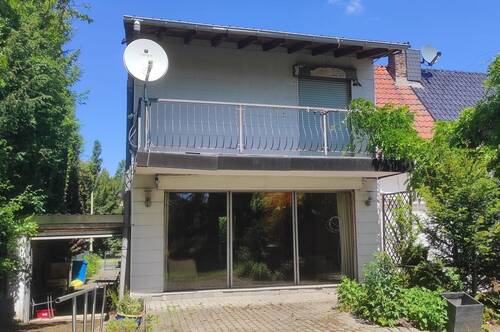 Anbau mir Garage - Einfamilienhaus mit 140,00 m² in Bad Vilbel zum Kaufen