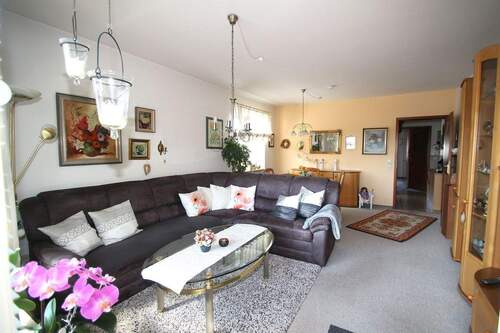 Das lichtdurchflutete Wohnzimmer - 3 Zimmer Etagenwohnung zum Kaufen in Malente