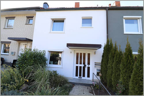 Bild 1 - Reihenhaus mit Garage, Parkplatz und Kunststofffenstern mit Dreifachverglasung