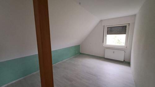 Schlafzimmer im Dachgeschoss - 