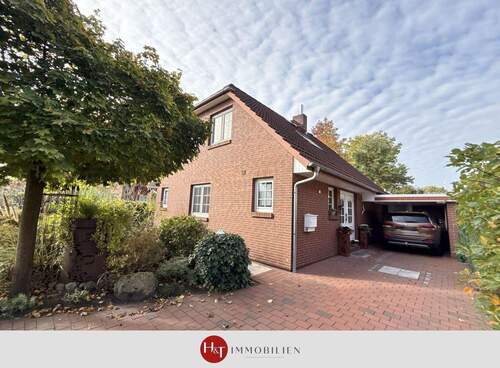Verkauf Haus Stuhr-Groß-Mackenstedt Hechler & Twachtmann Immobilien GmbH - Gepflegtes Einfamilienhaus mit Kamin und Wintergarten