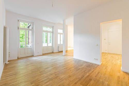 Wohnzimmer - 2-Zimmer-Eigentumswohnung mit Südbalkon und offener Wohnküche