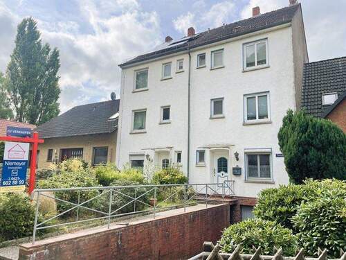 Hausansicht - *Preisreduktion* Wohnen mit Seeblick! Gepflegte Doppelhaushälfte mit neuer Heizung & viel Potenzial