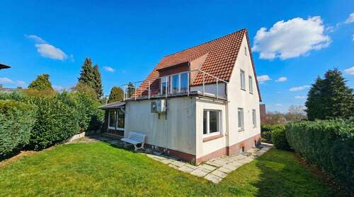 Hausrückseite - Einfamilienhaus mit 125,00 m&sup2; in Bad Oeynhausen zum Kaufen