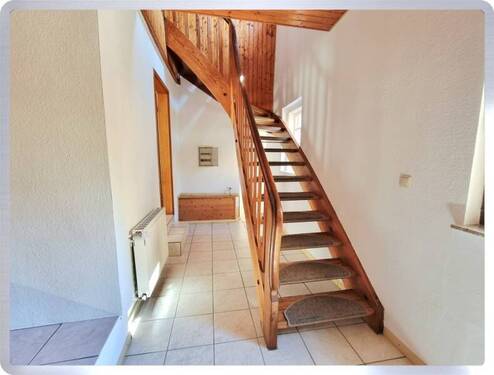 Vorderhaus EG Treppe - Einfamilienhaus mit 137,00 m² in Geisenheim zum Kaufen