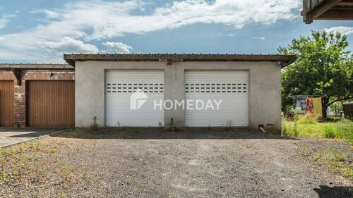 Garage - Mehrfamilienhaus, Wohnhaus mit 270,00 m² in Kalbach zum Kaufen
