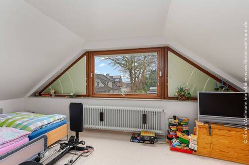 Schlafzimmer (11,42m²) mit Nordausrichtung. - 