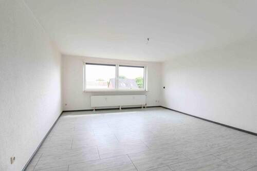 Wohnzimmer - 3 Zimmer Einfamilienhaus zum Kaufen in Langenhagen