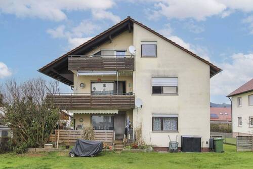 Rückansicht - Wißgoldigen: Voll vermietetes 3-Familienhaus mit Garten und 3 Garagen