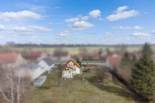 Luftaufnahme von Westen - 6 Zimmer Einfamilienhaus zum Kaufen in Neuruppin-Karwe