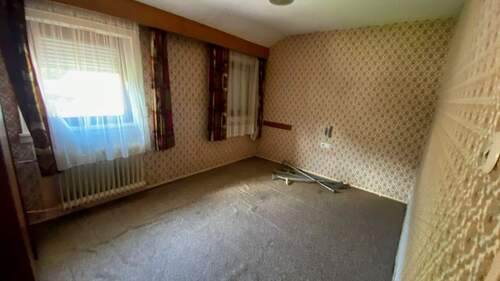 Zimmer im Dachgeschoss - 