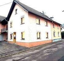 Charmantes Einfamilienhaus mit Garage, Scheune und zusätzlichem Gartengrundstück in Großlittgen