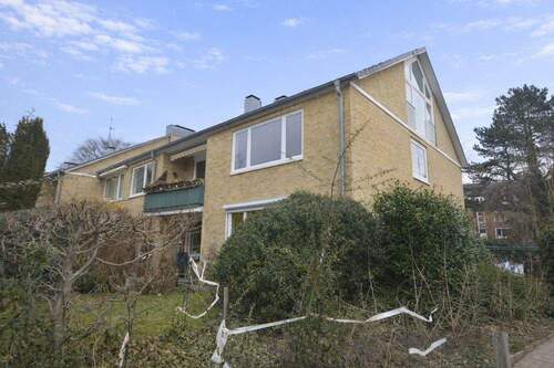 Hausansicht - Charmante Eigentumswohnung mit Balkon und vielseitigen Nutzungsmöglichkeiten