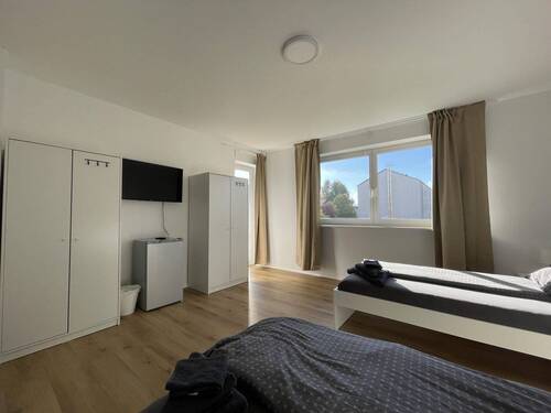 Wohnzimmer (aktuell Doppelzimmer - Etagenwohnung mit 66,00 m&sup2; in Schongau zum Kaufen