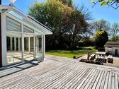 Gartenansicht mit Wintergarten - 