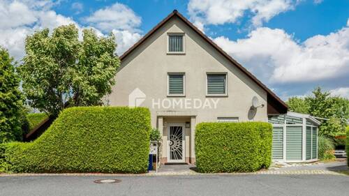 Außenansicht 1 - Vermietetes Wohlfühlhaus mit Garten, Terrasse, Wintergarten & Doppel-Carport