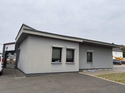 Wohn-/Geschäftsgebäude - 