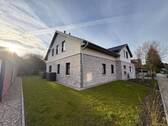 Gartenansicht - Erdgeschosswohnung mit Terrasse in Heide
