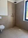 Bad mit ebenerdiger Dusche - 