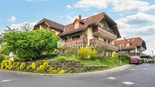 Außenansicht 1 - 79?m² Wohnkomfort mit Südterrasse, Tageslichtbad, Keller & TG-Stellplatz in ruhiger Lage