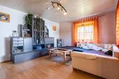 Wohnzimmer - 7 Zimmer Mehrfamilienhaus, Wohnhaus zum Kaufen in Hutthurm