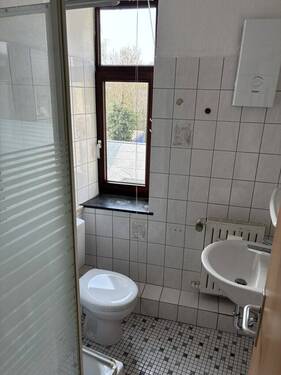 Wohnung 1. OG vorne, linke Haushälfte - 