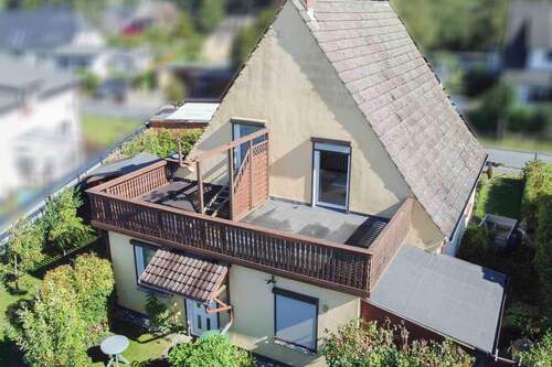 Rückansicht mit Dachterrasse - Einfamilienhaus mit 120,00 m² in Baabe zum Kaufen