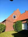 Rückansicht mit Anbau i.d. Morgensonne - Einfamilienhaus mit 85,00 m² in Wilster zum Kaufen