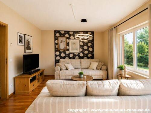 Bild 4 Wohnzimmer Ansicht 1 - Reihenmittelhaus mit 120,00 m&sup2; in Cottbus zum Kaufen