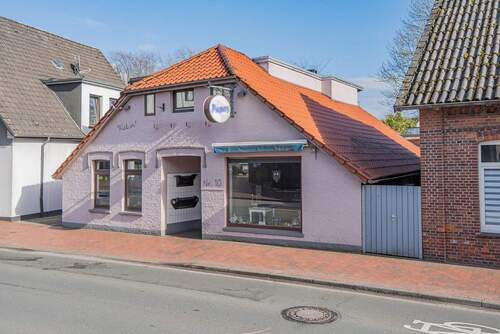 Straßenansicht (3) - 3 Zimmer Mehrfamilienhaus, Wohnhaus zum Kaufen in Westerstede