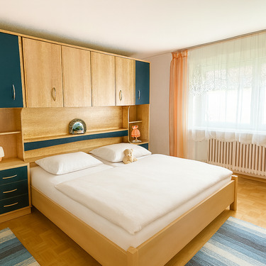 Schlafzimmer mit KI generiert und eingerichtet als Wohnbeispiel - 2 Zimmer Etagenwohnung in Füssen