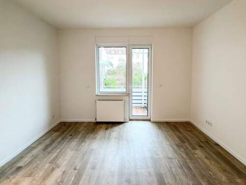 Wohnzimmer mit Balkon - Etagenwohnung mit 74,00 m&sup2; in Hamm zum Kaufen