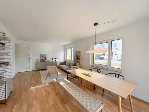 Musterwohnung Wohnzimmer - Etagenwohnung mit 74,70 m&sup2; in Erding zum Kaufen