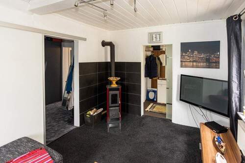 DG: Wohnen mit Kaminofen - 