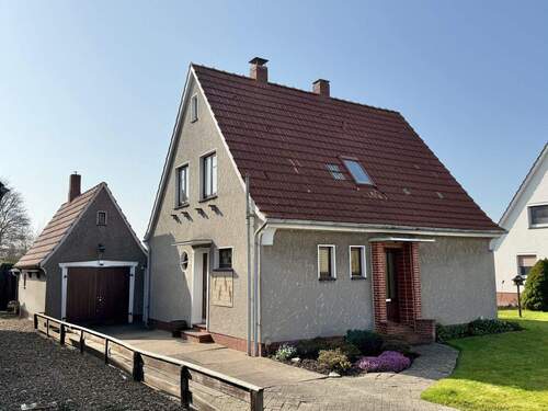 Ansicht - Sanierungsbedürftiges Zuhause mit Charakter und Südgarten – direkt am Weserdeich gelegen