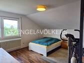 Zimmer im Dachgeschoss - 