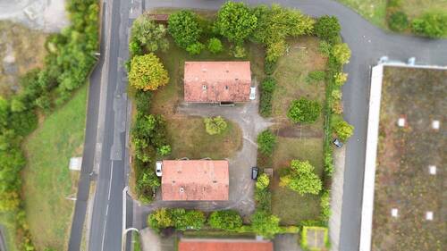 Blick von oben auf das Grundstück - 2 Zimmer Einfamilienhaus zum Kaufen in Bad Neustadt an der Saale
