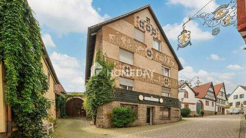 Außenansicht 3 - Attraktive 3-Zimmer-Erdgeschosswohnung mit großer Terrasse in gepflegtem Mehrfamilienhaus