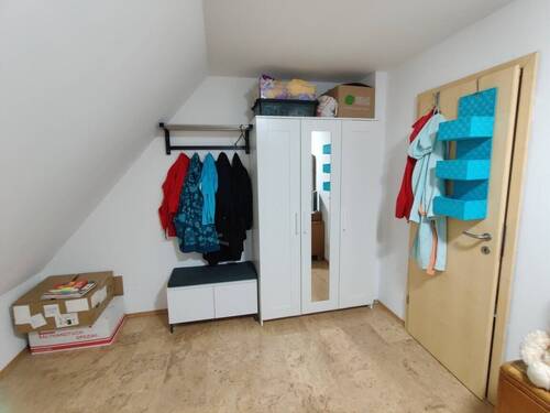 Zimmer im Dachgeschoss - 