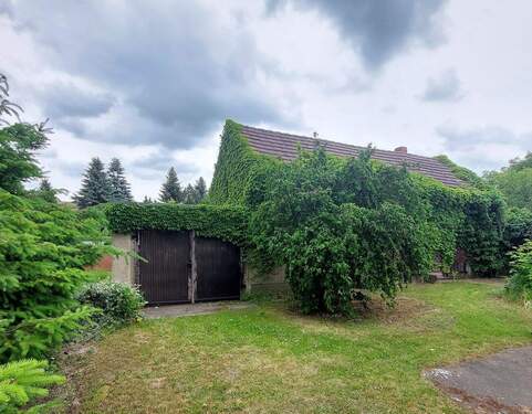 Nebengelass mit Garage - 